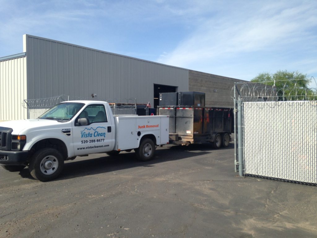 A truck parked in front of a building.