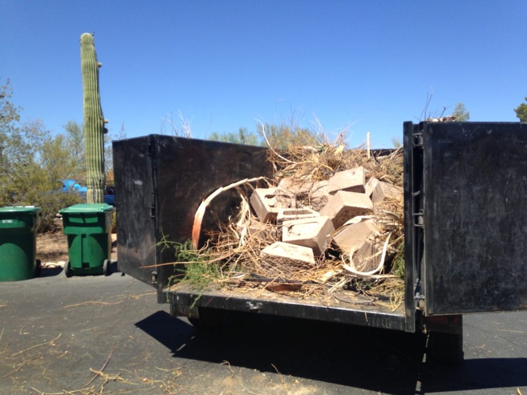 construction debris removal Tucson AZ job site cleared of drywall, glass and lumber