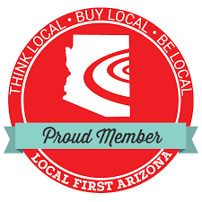A red and white sticker with the words " think local, buy local, be local ".