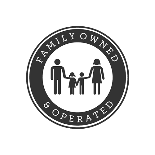 A black and white family owned sign