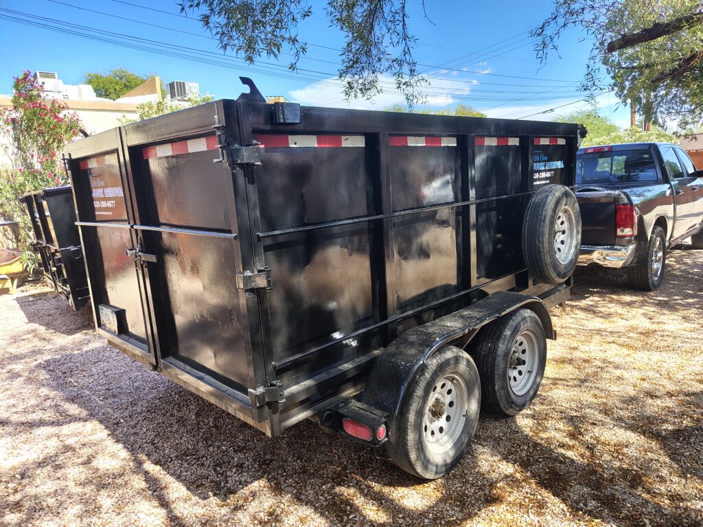 A vista clean truck and trailer parked on a property