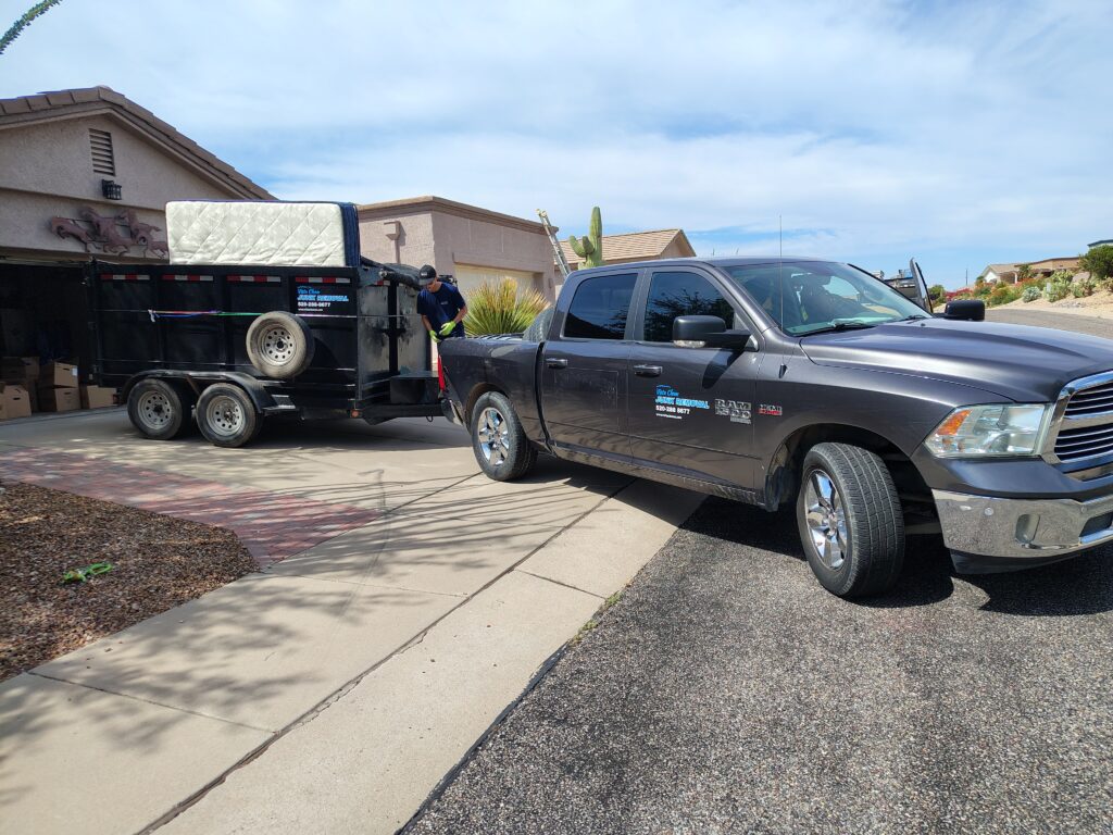 Vista Clean Junk Removal truck and trailer loaded up, from an estate clean out job in Green Valley, AZ